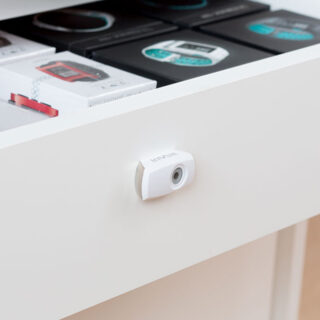 Cam Lock, smart digital lock, open drawer with watches inside, store