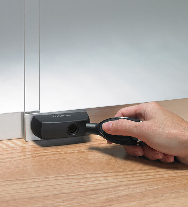 plunger lock, smart lock, fitted to glass sliding door, digital key about to unlock sliding door