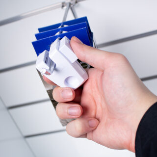 IR StopLok, hanging merchandise. Lock being locked, hangsell