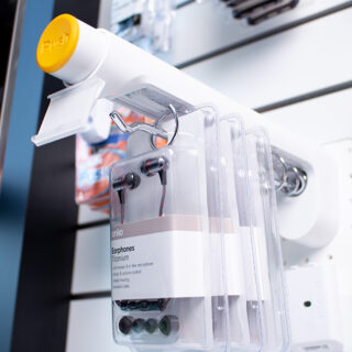 T1000 Time Delay Dispenser, preventing product sweeping, hangsell