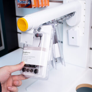 T1000 Time Delay Dispenser, preventing product sweeping, customer holding product, hangsell