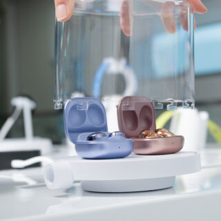 InVue Display case, unlocked and products being accessed, Ear pods security