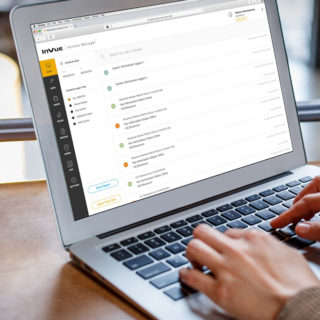 Person on laptop, using InVue LIVE Access software