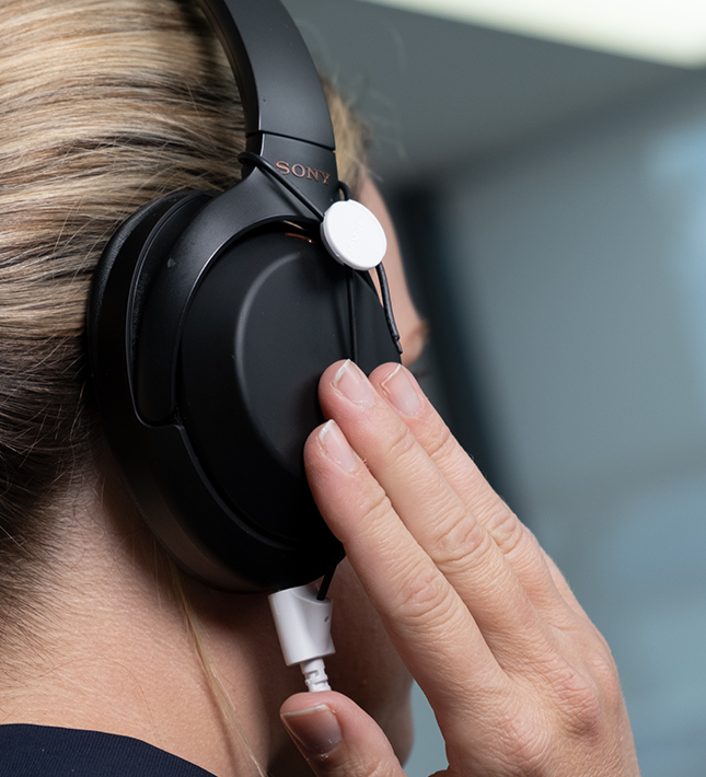 Consumer testing headphones that have zips recoiler security attached