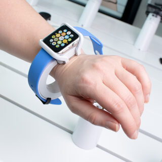 Wearables security for smart watch, OnePOD Wearable by InVue, customer trying on smart watch