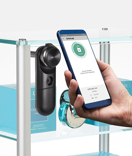 InVue LIVE Cam Lock, app based lock, being unlocked with phone app, housing perfume in glass cabinet