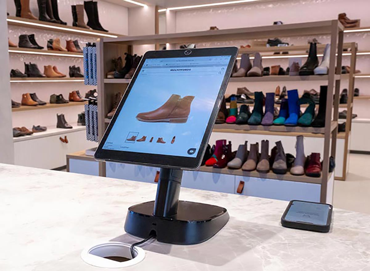InVue CT150 Tablet Stand rotated to be customer facing in store at a Munro Footwear Group